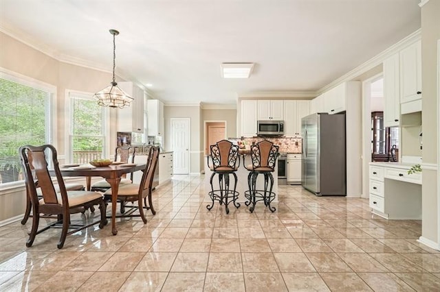 3130 Crestmont Way NW, Kennesaw, GA 30152 - dining room featuring crown molding, a chandelier, and baseboards