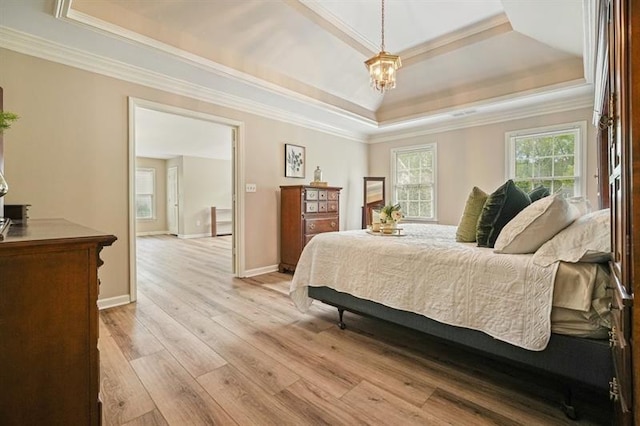 3130 Crestmont Way NW, Kennesaw, GA 30152 - bedroom with a tray ceiling, ornamental molding, light wood-type flooring, a chandelier, and baseboards