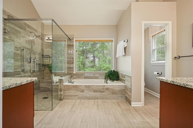 3130 Crestmont Way NW, Kennesaw, GA 30152 - full bathroom with a bath, vanity, a stall shower, toilet, and baseboards