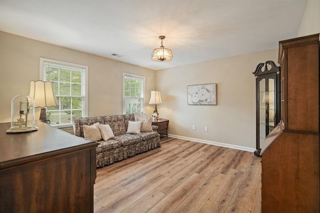 3130 Crestmont Way NW, Kennesaw, GA 30152 - living room featuring light wood-style floors and baseboards