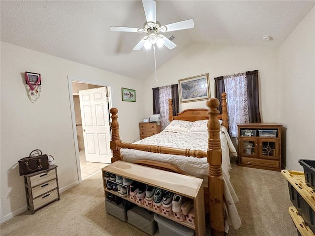 bedroom with lofted ceiling, ceiling fan, light carpet, and baseboards