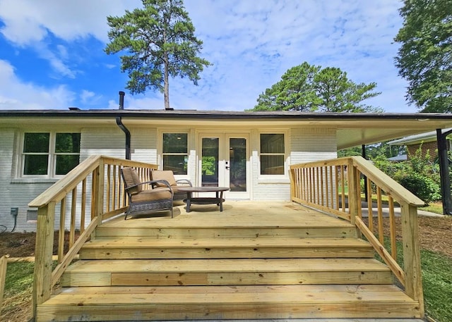 wooden terrace featuring french doors