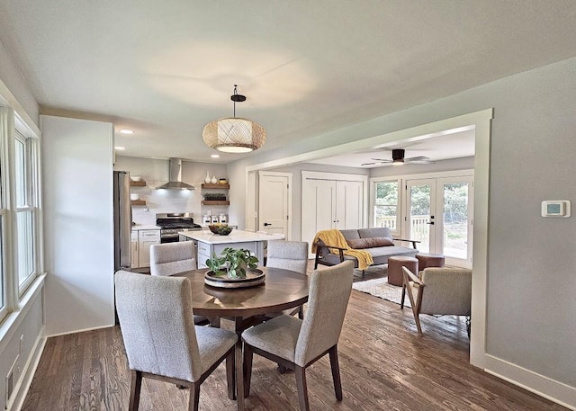 dining room featuring dark wood finished floors, recessed lighting, ceiling fan, baseboards, and french doors