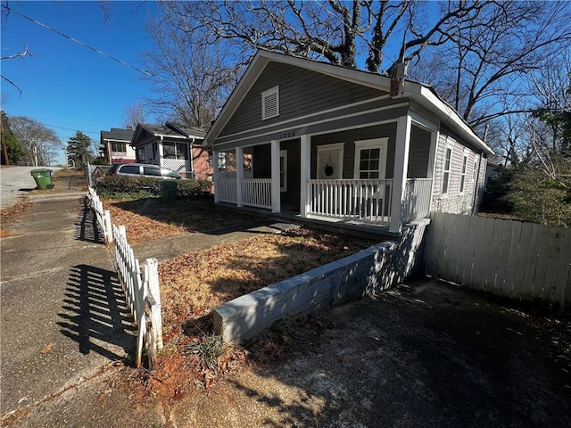 bungalow-style house featuring covered porch