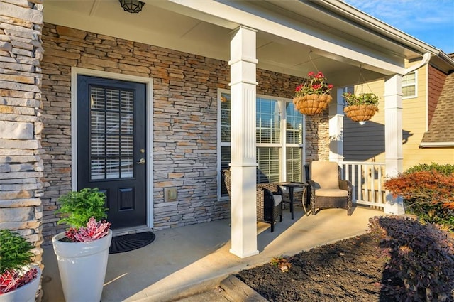 entrance to property with a porch