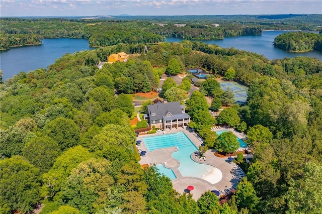 bird's eye view featuring a water view and a view of trees