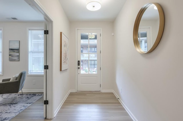 entryway with light wood-type flooring