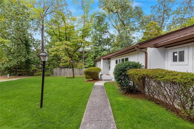 view of yard featuring fence