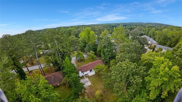 aerial view with a wooded view