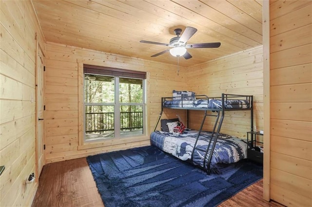 1102 Soque Wilderness Rd, Clarkesville, GA 30523 - bedroom with wooden ceiling, wood walls, and wood finished floors