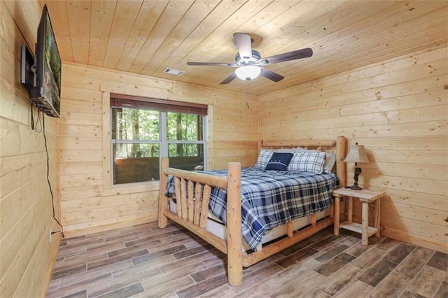 1102 Soque Wilderness Rd, Clarkesville, GA 30523 - bedroom featuring wooden ceiling, wooden walls, wood finished floors, and ceiling fan