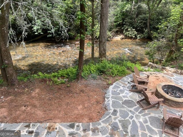 1102 Soque Wilderness Rd, Clarkesville, GA 30523 - view of yard featuring a fire pit and a patio area