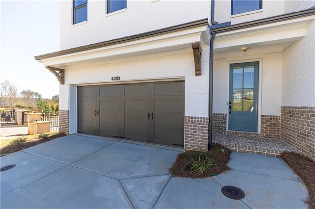 709 Dodd Ln Unit 165, Buford, GA 30518 - garage featuring driveway