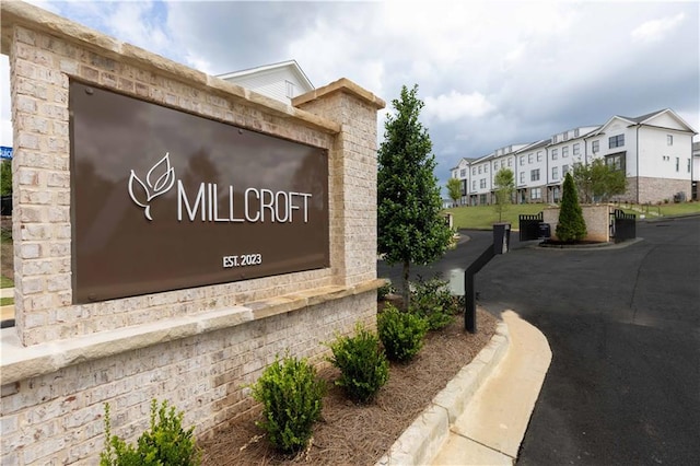 709 Dodd Ln Unit 165, Buford, GA 30518 - community / neighborhood sign featuring a residential view