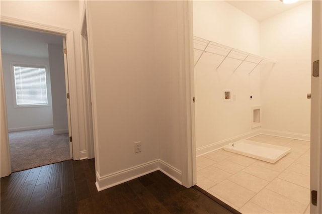 709 Dodd Ln Unit 165, Buford, GA 30518 - washroom featuring electric dryer hookup, washer hookup, dark wood-style floors, and baseboards
