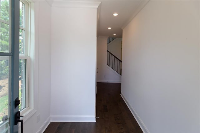 709 Dodd Ln Unit 165, Buford, GA 30518 - hall featuring baseboards, stairway, dark wood-style floors, recessed lighting, and ornamental molding