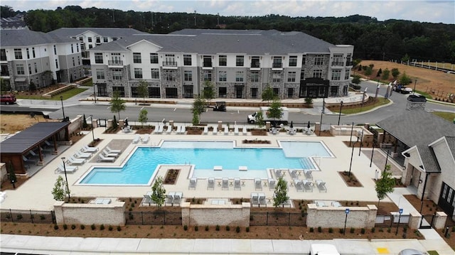 709 Dodd Ln Unit 165, Buford, GA 30518 - drone / aerial view of a pool