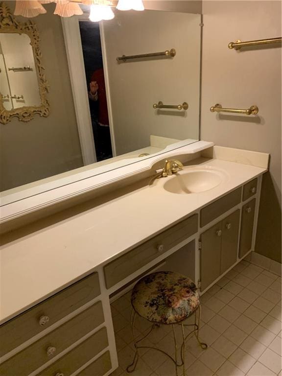 bathroom with vanity, tile patterned floors, and ceiling fan