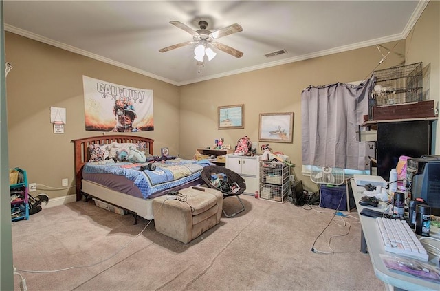 carpeted bedroom with crown molding and ceiling fan