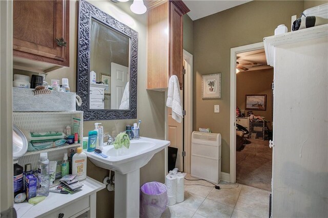 bathroom with tile patterned floors