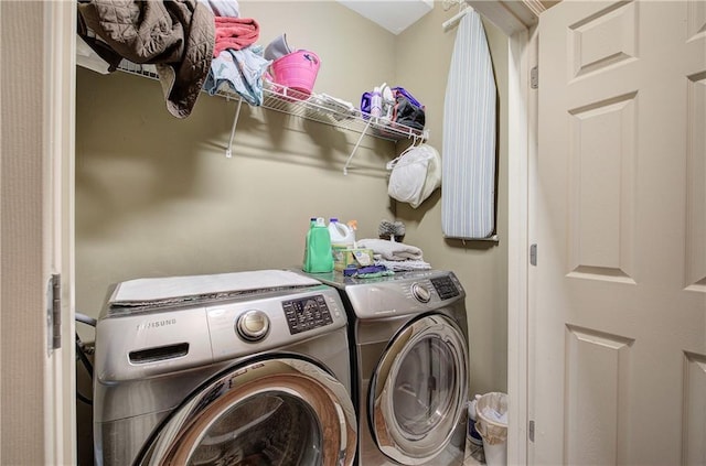 laundry area with washer and clothes dryer
