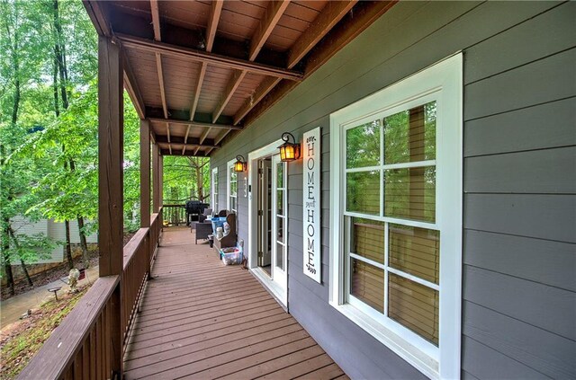 wooden terrace with covered porch