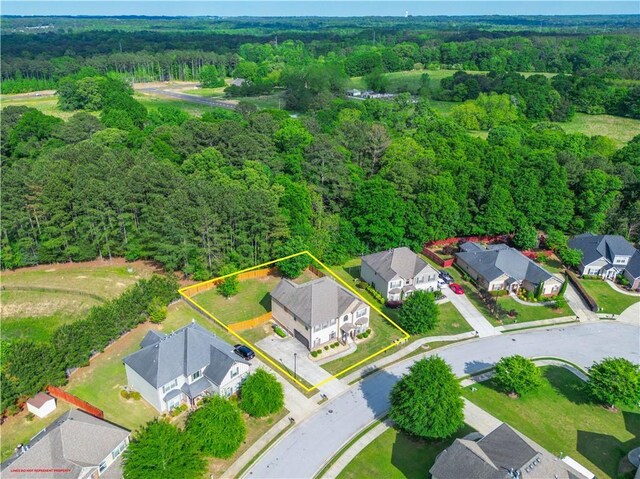 bird's eye view with a view of trees and a residential view