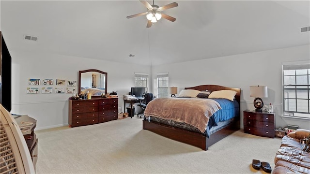 carpeted bedroom featuring ceiling fan and lofted ceiling