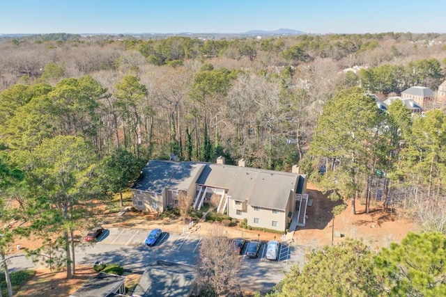 drone / aerial view with a forest view