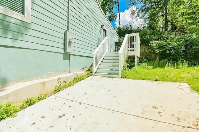 view of home's exterior with a patio