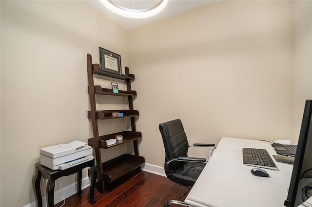 office featuring dark wood-type flooring and baseboards