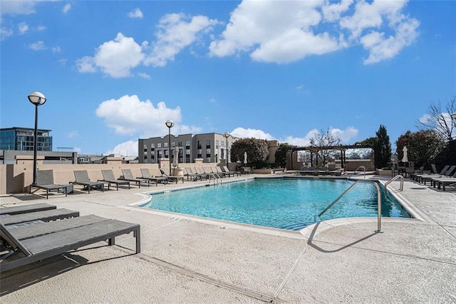 view of pool featuring a patio area