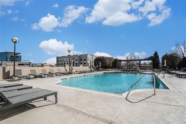 community pool featuring a patio