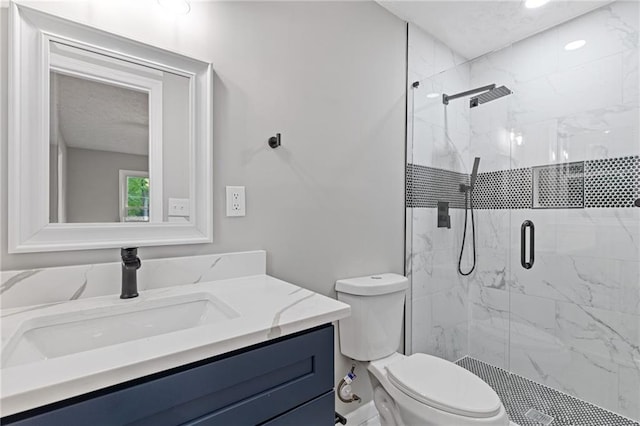 679 Creek View Dr, Lawrenceville, GA 30044 - bathroom featuring toilet, a marble finish shower, and vanity