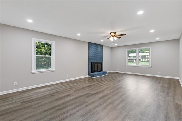 679 Creek View Dr, Lawrenceville, GA 30044 - unfurnished living room featuring a ceiling fan, healthy amount of natural light, dark wood finished floors, and recessed lighting