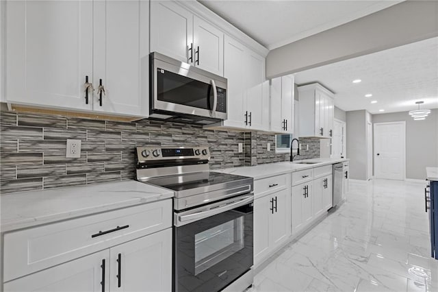 679 Creek View Dr, Lawrenceville, GA 30044 - kitchen with stainless steel appliances, a sink, white cabinetry, light marble finish floors, and light stone countertops
