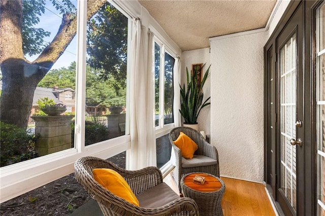 1445 Monroe Dr NE Unit 14B, Atlanta, GA 30324 - sunroom / solarium with a textured wall, wood finished floors, and a textured ceiling