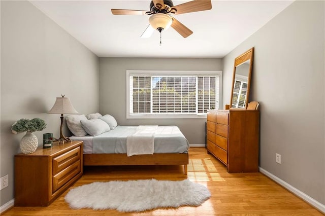 1445 Monroe Dr NE Unit 14B, Atlanta, GA 30324 - bedroom featuring light wood-style floors and a ceiling fan