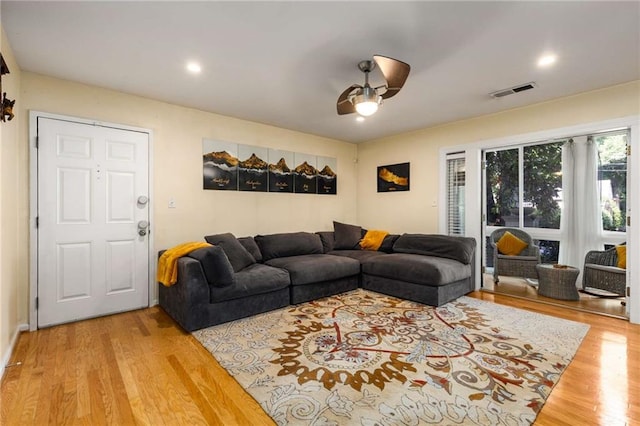 1445 Monroe Dr NE Unit 14B, Atlanta, GA 30324 - living room featuring wood finished floors, a ceiling fan, and recessed lighting