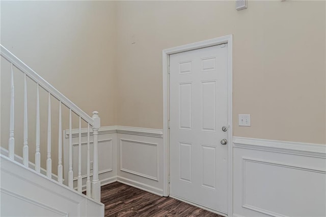 foyer entrance with dark hardwood / wood-style floors