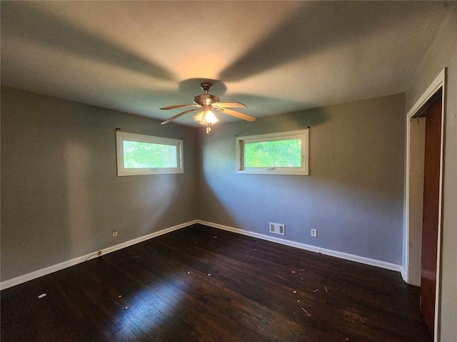 1321 Snapfinger Rd, Decatur, GA 30032 - empty room with wood-type flooring, healthy amount of natural light, baseboards, and a ceiling fan