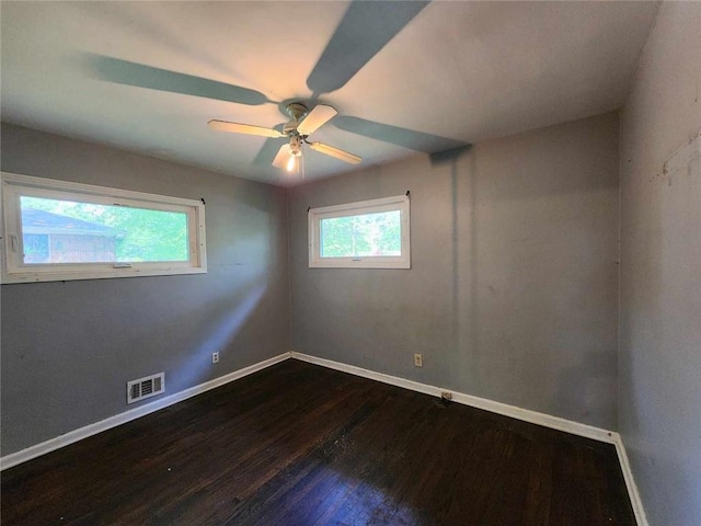 1321 Snapfinger Rd, Decatur, GA 30032 - empty room featuring baseboards, dark wood-style floors, and a ceiling fan