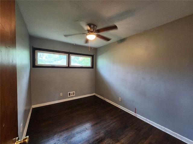 1321 Snapfinger Rd, Decatur, GA 30032 - spare room with ceiling fan, dark wood-style flooring, and baseboards