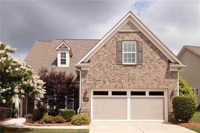 3678 Cresswind Pkwy SW, Gainesville, GA 30504 - view of front of property featuring concrete driveway, brick siding, and an attached garage
