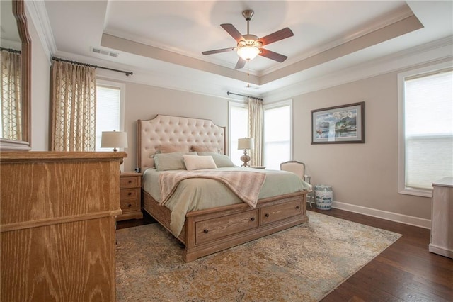 3678 Cresswind Pkwy SW, Gainesville, GA 30504 - bedroom with a raised ceiling, ornamental molding, baseboards, dark wood-style flooring, and ceiling fan