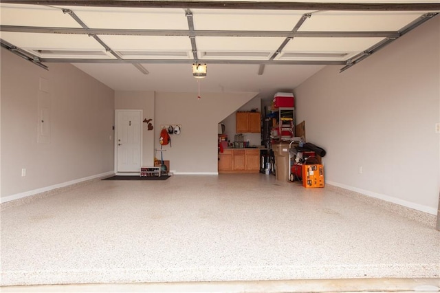 3678 Cresswind Pkwy SW, Gainesville, GA 30504 - garage featuring a garage door opener and baseboards