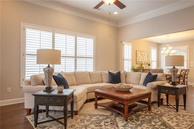 3678 Cresswind Pkwy SW, Gainesville, GA 30504 - living room with a ceiling fan, baseboards, wood finished floors, crown molding, and a chandelier