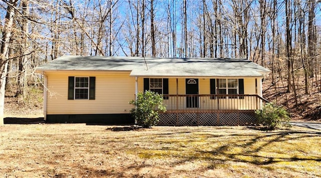 view of front of house with crawl space and covered porch