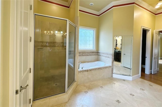 bathroom featuring crown molding, plus walk in shower, and tile patterned floors