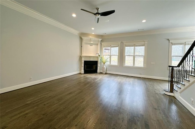 unfurnished living room with ceiling fan, dark hardwood / wood-style flooring, and crown molding